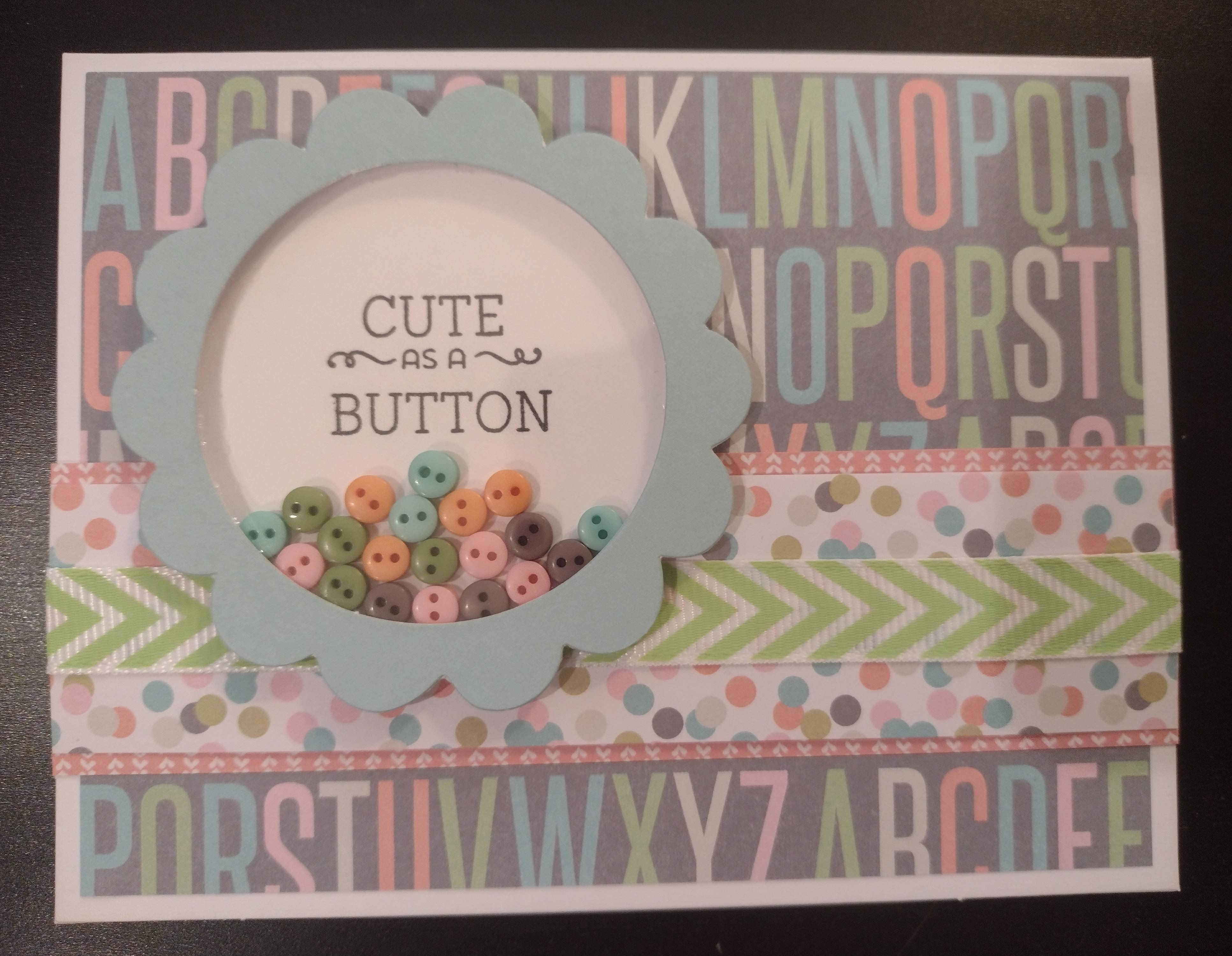 Cute as a Button card with colorful alphabet background